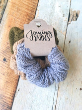 Load image into Gallery viewer, Bundle of three scrunchies in gray, sand, and olive held together in a tag.
