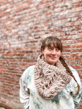 Load image into Gallery viewer, Fossil Cowl in beige shown on a model wearing a white sweatshirt against a brick wall
