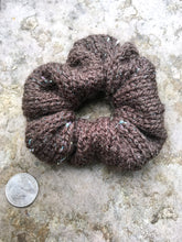 Load image into Gallery viewer, One scrunchie is shown in a flat lay with a quarter for scale.
