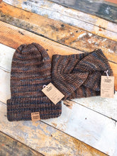 Load image into Gallery viewer, A folded brim beanie and knotted headwrap in flat lay.  Both are made with blue and brown tones.

