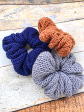 Load image into Gallery viewer, Three scrunchies in a flat lay.  The bottom scrunchie is navy with a gray  and copper scrunchies on top.
